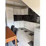 Ina *